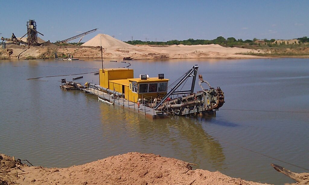 Diesel Chain Ladder Dredge converted to electric power by Aggregate Consulting