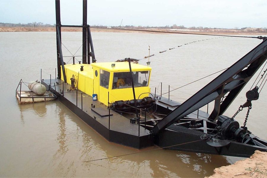Cutter suction dredge working a sand and gravel pond